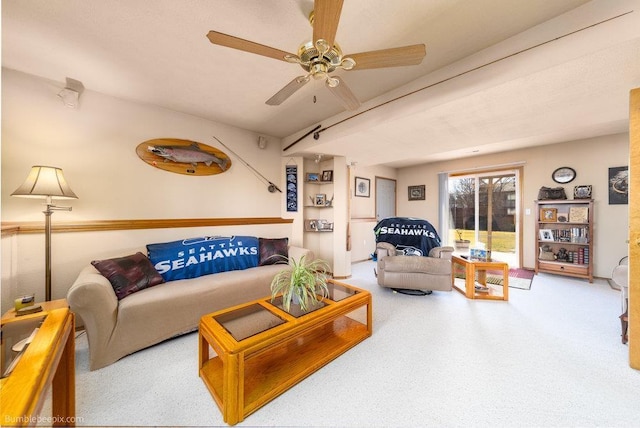 living area featuring ceiling fan