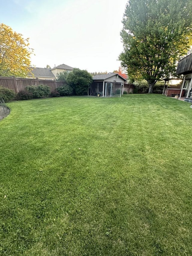 view of yard featuring a fenced backyard