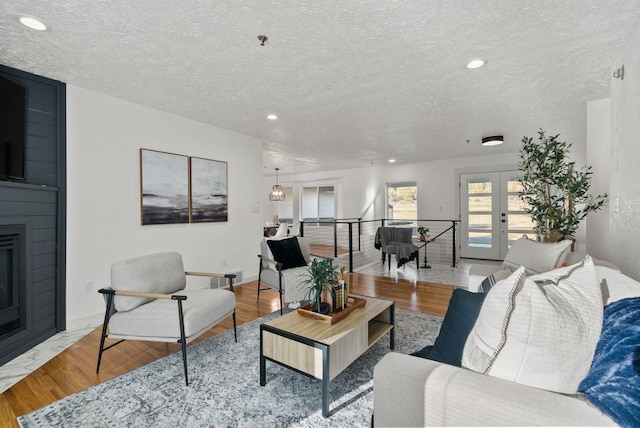 14505 W Coulee Hite Rd, Spokane, WA 99224 - living room with wood finished floors and recessed lighting