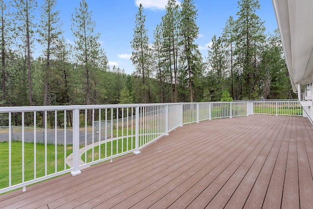 14505 W Coulee Hite Rd, Spokane, WA 99224 - wooden terrace with a lawn and a wooded view