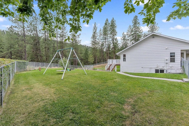 14505 W Coulee Hite Rd, Spokane, WA 99224 - view of yard with a fenced backyard, a playground, and stairs