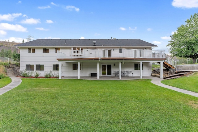 14505 W Coulee Hite Rd, Spokane, WA 99224 - rear view of house with stairs, a deck, a patio area, and a yard
