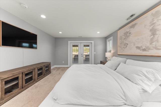 16215 W Coulee Hite Rd, Spokane, WA 99224 - bedroom featuring french doors, access to outside, light carpet, recessed lighting, and baseboards