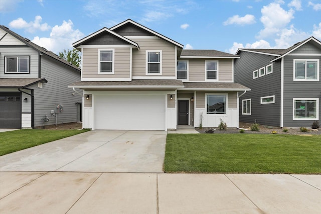 503 N Arc Ct, Spokane Valley, WA 99016 - view of front of home with driveway, a garage, a front lawn, and a shingled roof
