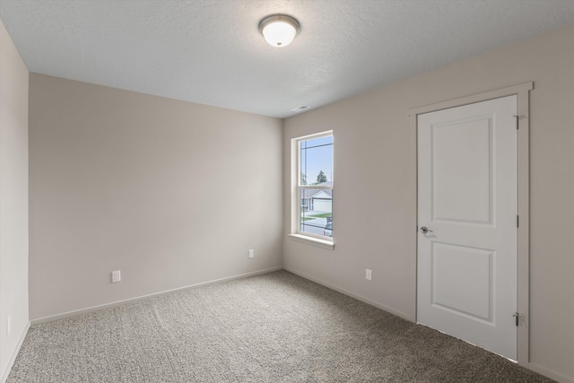 503 N Arc Ct, Spokane Valley, WA 99016 - carpeted spare room featuring baseboards