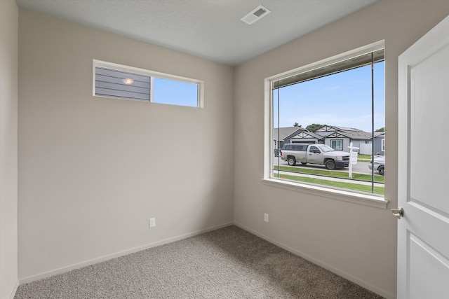 503 N Arc Ct, Spokane Valley, WA 99016 - carpeted empty room featuring baseboards