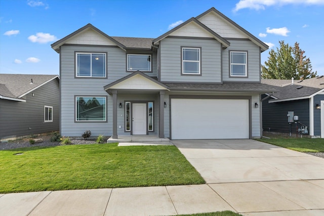 view of front of home featuring concrete driveway, a shingled roof, an attached garage, and a front lawn