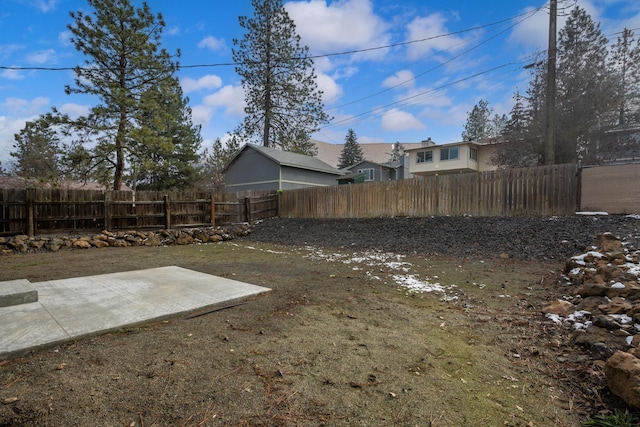 view of yard featuring a fenced backyard and a patio