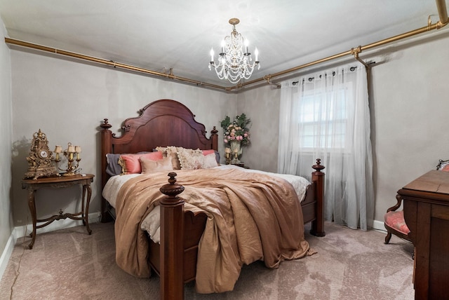 1733 S SE Blvd, Spokane, WA 99203 - bedroom featuring light carpet, a chandelier, and baseboards