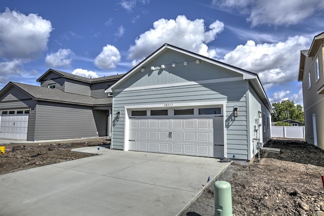 18517 E Michielli Ln, Spokane Valley, WA 99016 - view of front of property featuring an attached garage and concrete driveway
