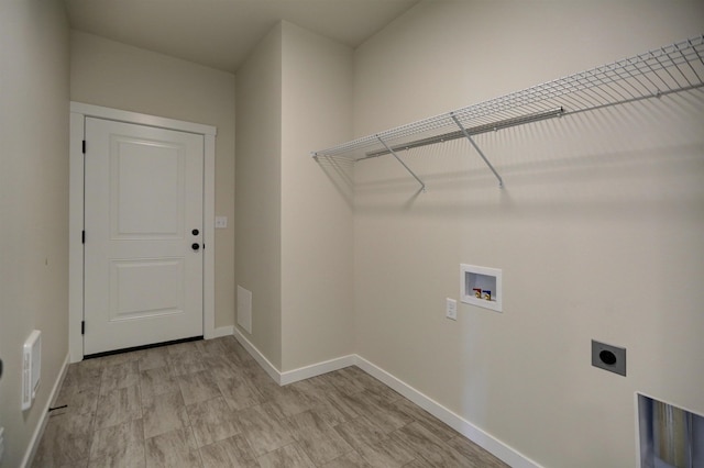 18517 E Michielli Ln, Spokane Valley, WA 99016 - washroom with electric dryer hookup, hookup for a washing machine, and baseboards