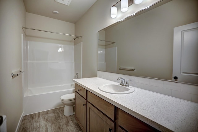 18517 E Michielli Ln, Spokane Valley, WA 99016 - full bath with vanity, toilet, shower / tub combination, and tasteful backsplash