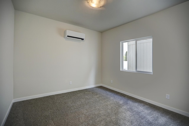 18517 E Michielli Ln, Spokane Valley, WA 99016 - empty room featuring an AC wall unit, baseboards, and dark carpet