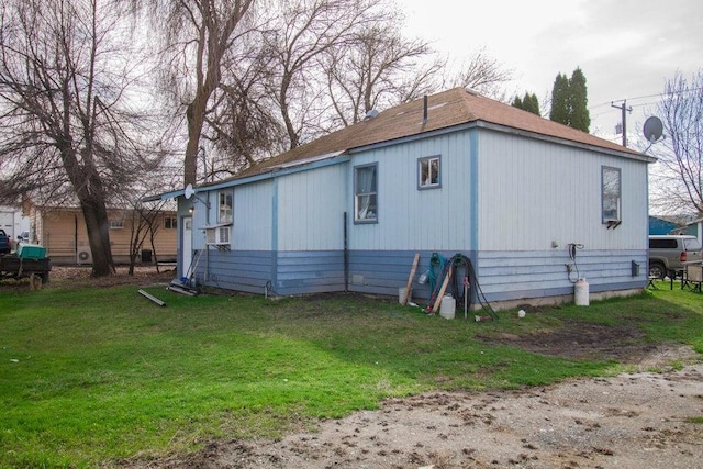 exterior space with a yard