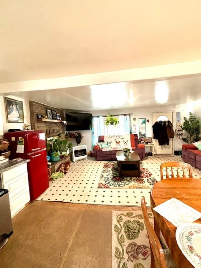 living room featuring concrete flooring