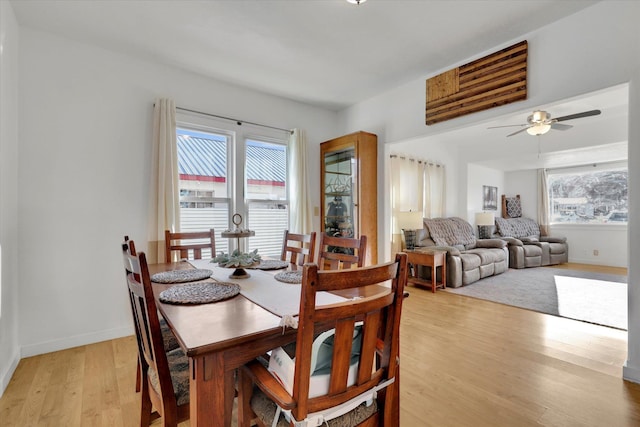 404 N Washington Ave, Newport, WA 99156 - dining space featuring light wood finished floors, baseboards, and a ceiling fan