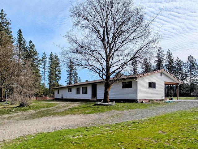 28 Enzyme Ln, Kettle Falls, WA 99141 - view of front of property with driveway and a front yard