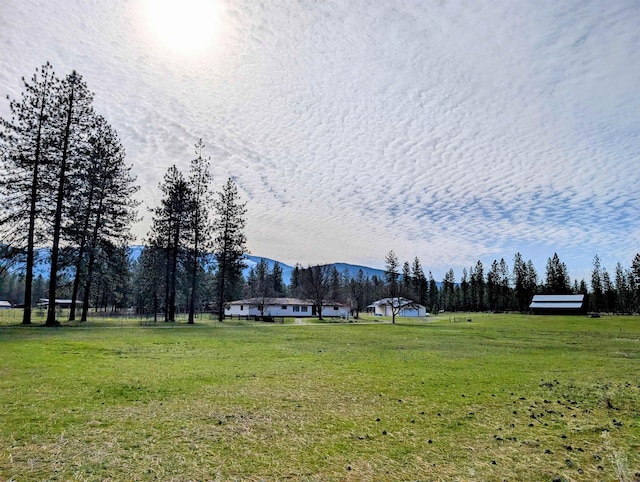 28 Enzyme Ln, Kettle Falls, WA 99141 - view of home's community with a mountain view and a yard