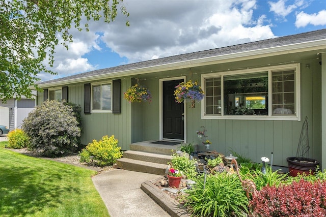 305 S Steen Rd, Veradale, WA 99037 - property entrance with a lawn and roof with shingles