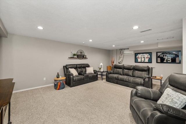 living area featuring recessed lighting, carpet flooring, and visible vents