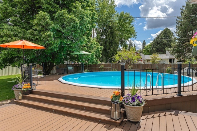 305 S Steen Rd, Veradale, WA 99037 - view of swimming pool featuring a fenced backyard and a wooden deck