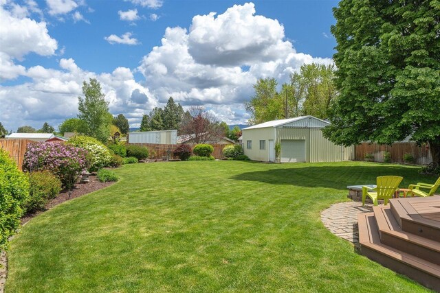 305 S Steen Rd, Veradale, WA 99037 - view of yard featuring an outdoor structure and a garage