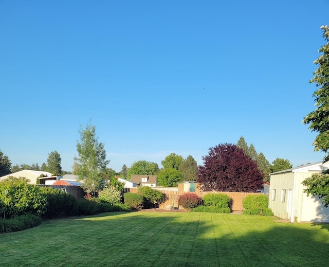 view of yard with fence