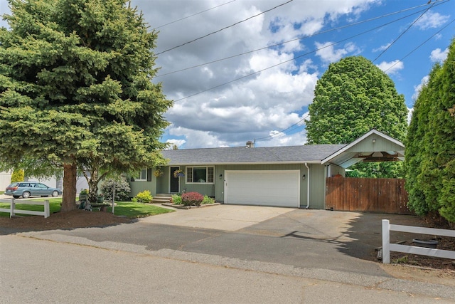 305 S Steen Rd, Veradale, WA 99037 - single story home featuring a garage, concrete driveway, and roof with shingles