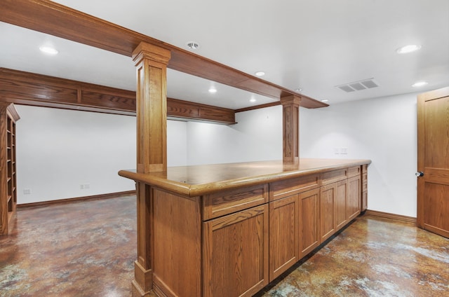 kitchen with finished concrete floors, visible vents, and recessed lighting