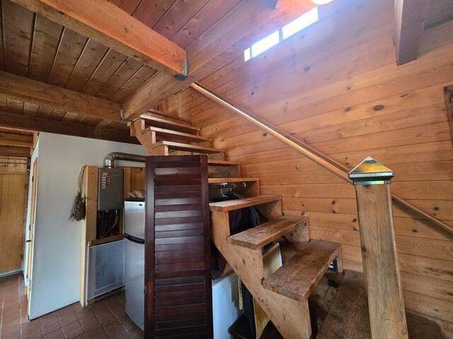 3434G Rockcut Rd, Kettle Falls, WA 99141 - staircase with wooden ceiling with exposed beams and wood walls