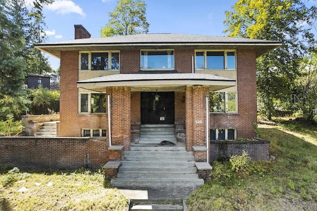 540 E Rockwood Blvd, Spokane, WA 99202 - view of front of house with brick siding and a chimney