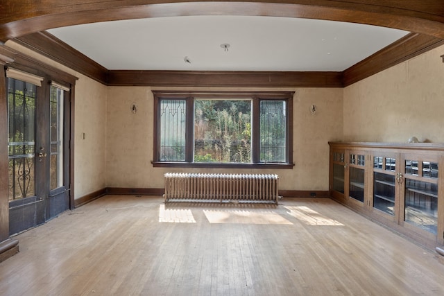 540 E Rockwood Blvd, Spokane, WA 99202 - interior space with radiator heating unit, baseboards, hardwood / wood-style floors, and crown molding