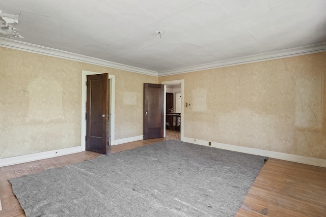 540 E Rockwood Blvd, Spokane, WA 99202 - unfurnished room featuring baseboards, ornamental molding, and wood finished floors