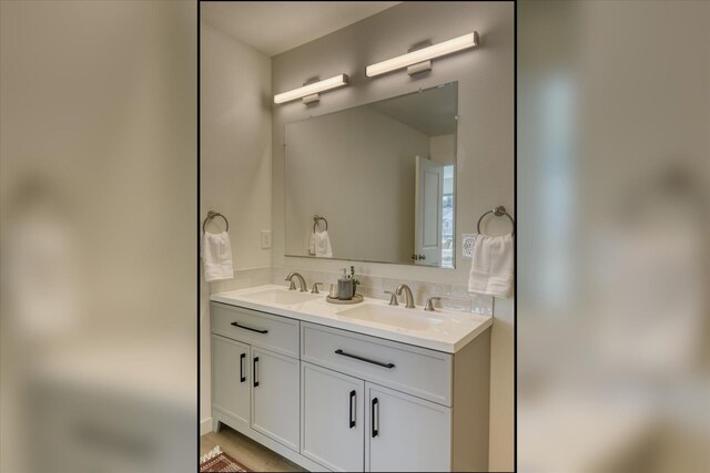 4907 E 6th Avenue 4909E 6Th Ave, Spokane Valley, WA 99212 - bathroom featuring double vanity and a sink