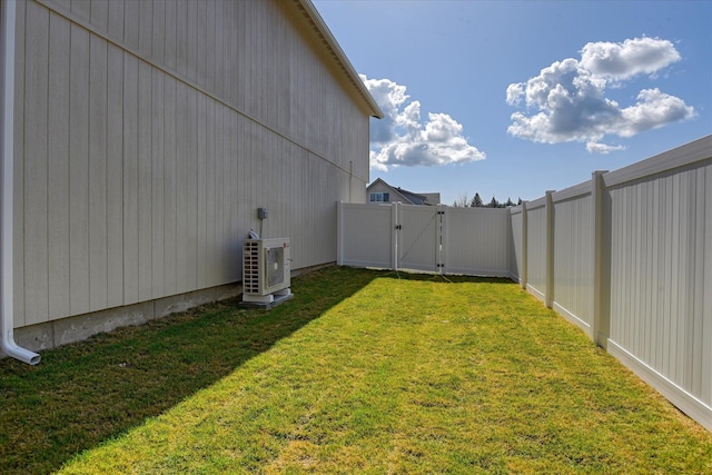 4907 E 6th Avenue 4909E 6Th Ave, Spokane Valley, WA 99212 - view of yard featuring fence, a gate, and ac unit