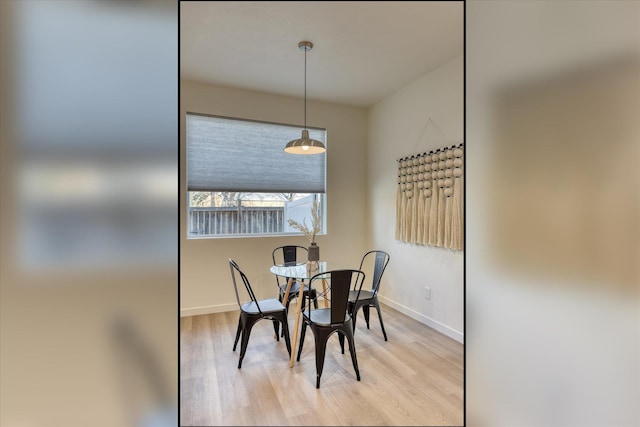 4907 E 6th Avenue 4909E 6Th Ave, Spokane Valley, WA 99212 - dining area featuring light wood-style flooring and baseboards