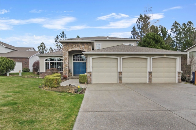 4357 S Greystone Ln, Spokane, WA 99203 - view of front of home featuring a garage, stucco siding, stone siding, a front lawn, and driveway