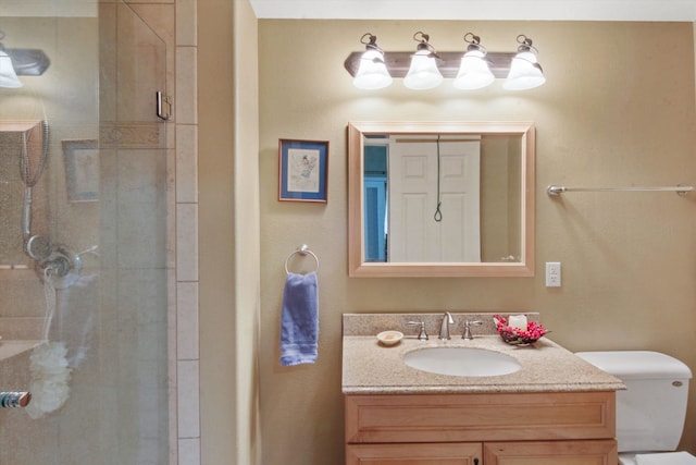 4357 S Greystone Ln, Spokane, WA 99203 - full bathroom featuring a shower stall, vanity, and toilet