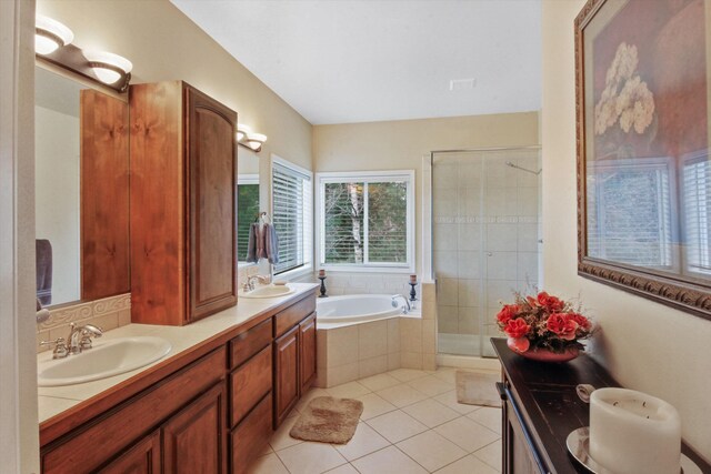 4357 S Greystone Ln, Spokane, WA 99203 - bathroom with a sink, tile patterned flooring, a stall shower, and a garden tub