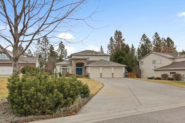 4357 S Greystone Ln, Spokane, WA 99203 - view of front of house with a garage and driveway