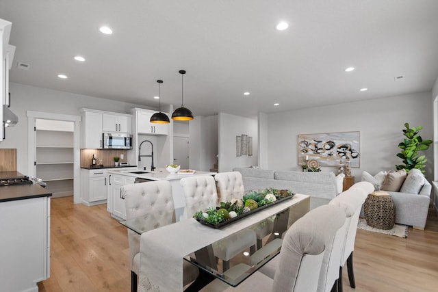 13310 N Starling Ln, Spokane, WA 99208 - dining space with recessed lighting and light wood-style flooring