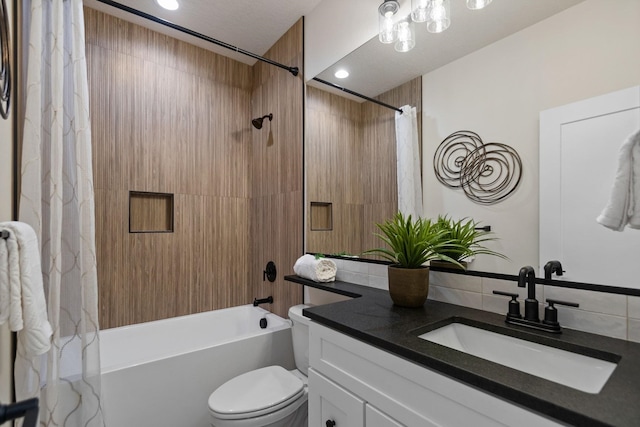 13310 N Starling Ln, Spokane, WA 99208 - full bathroom featuring shower / bath combo, vanity, backsplash, and toilet