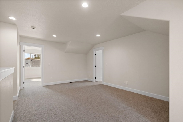 13310 N Starling Ln, Spokane, WA 99208 - bonus room featuring recessed lighting, baseboards, vaulted ceiling, and carpet floors