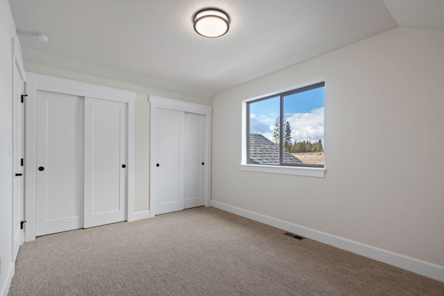 13310 N Starling Ln, Spokane, WA 99208 - unfurnished bedroom with visible vents, multiple closets, carpet flooring, and baseboards