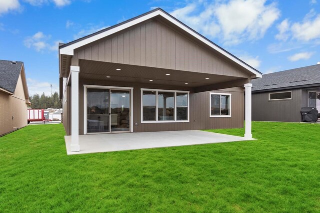 13310 N Starling Ln, Spokane, WA 99208 - back of property featuring a yard and a patio area