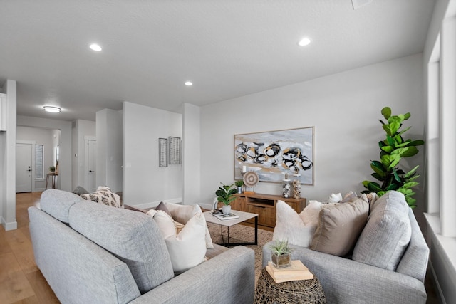 13310 N Starling Ln, Spokane, WA 99208 - living room with recessed lighting, light wood-type flooring, and baseboards