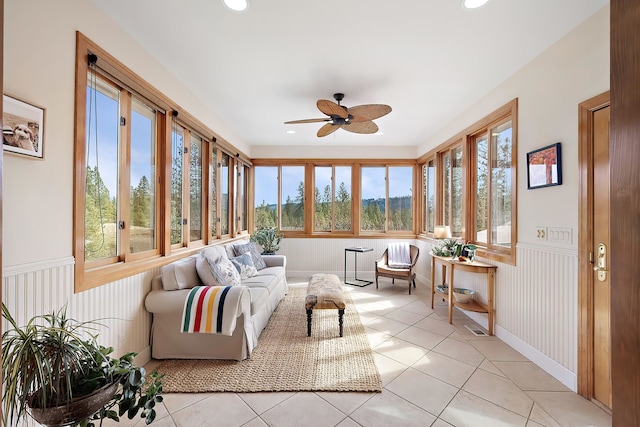 13615 N Riverbluff Ln, Spokane, WA 99208 - sunroom / solarium with tile patterned floors, wainscoting, and recessed lighting