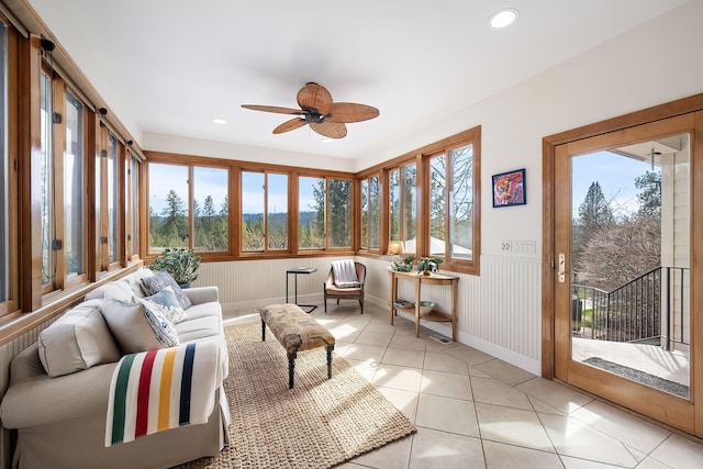 13615 N Riverbluff Ln, Spokane, WA 99208 - sunroom / solarium featuring tile patterned floors, wainscoting, and recessed lighting