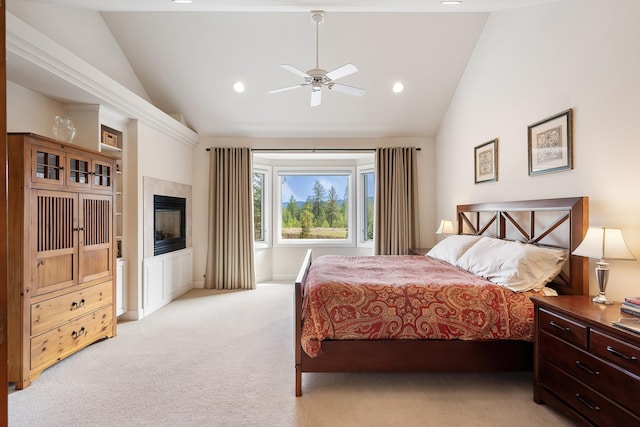 13615 N Riverbluff Ln, Spokane, WA 99208 - bedroom with ceiling fan, a fireplace, light colored carpet, recessed lighting, and lofted ceiling