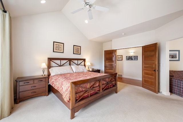 13615 N Riverbluff Ln, Spokane, WA 99208 - bedroom with ceiling fan, vaulted ceiling, recessed lighting, light carpet, and baseboards